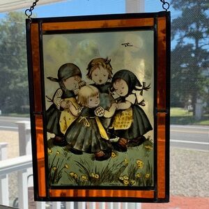 Vintage leaded glass sun catcher of children playing